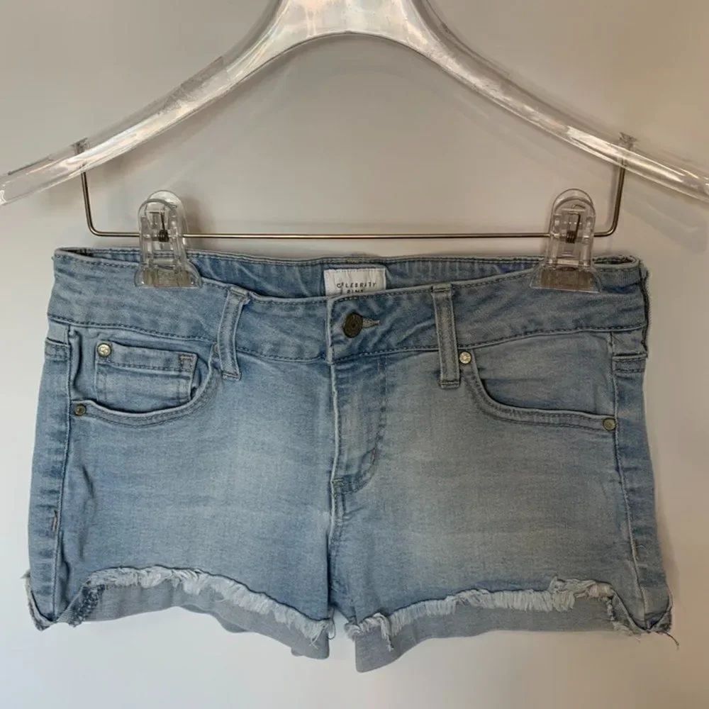 Celebrity Pink Light Washed Distressed Denim Short
